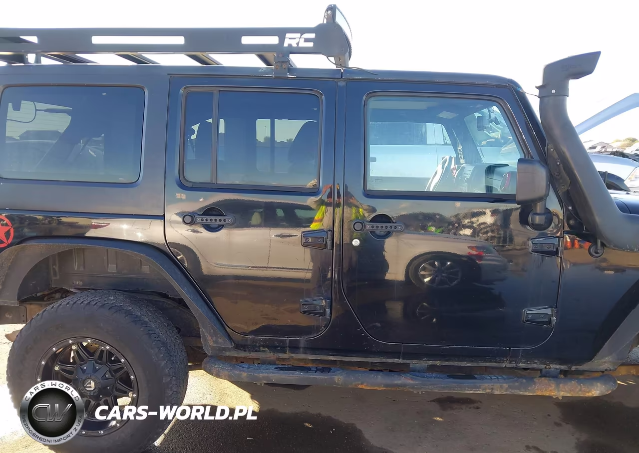 2013 Jeep Wrangler Unlimited Sport VIN:1C4BJWDG1DL621817 - 13