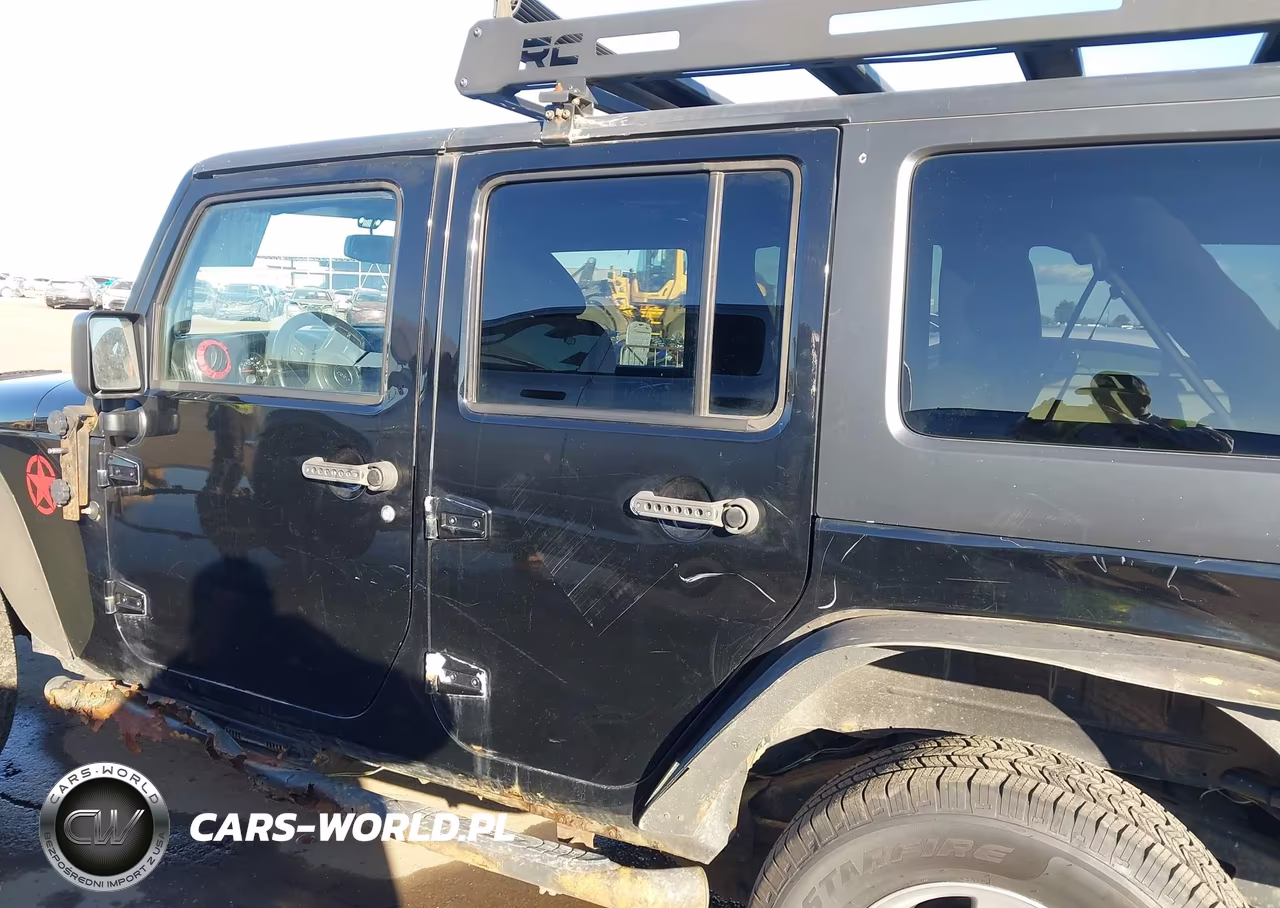 2013 Jeep Wrangler Unlimited Sport VIN:1C4BJWDG1DL621817 - 14