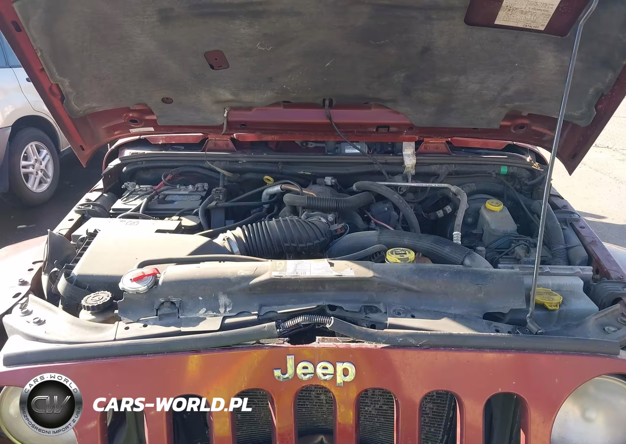 2007 Jeep Wrangler Unlimited Sahara VIN:1J4GA59157L220676 - 10
