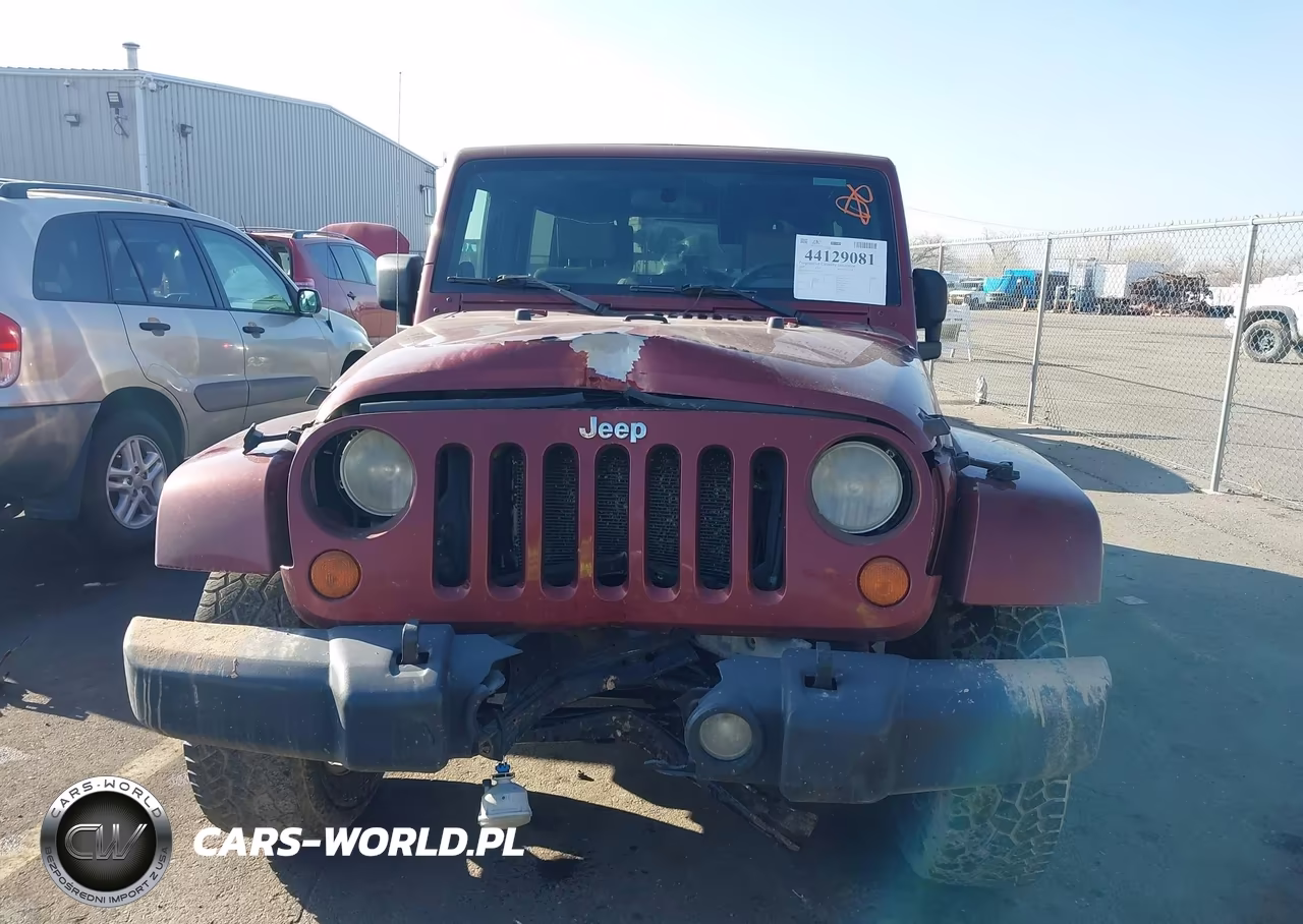 2007 Jeep Wrangler Unlimited Sahara VIN:1J4GA59157L220676 - 12