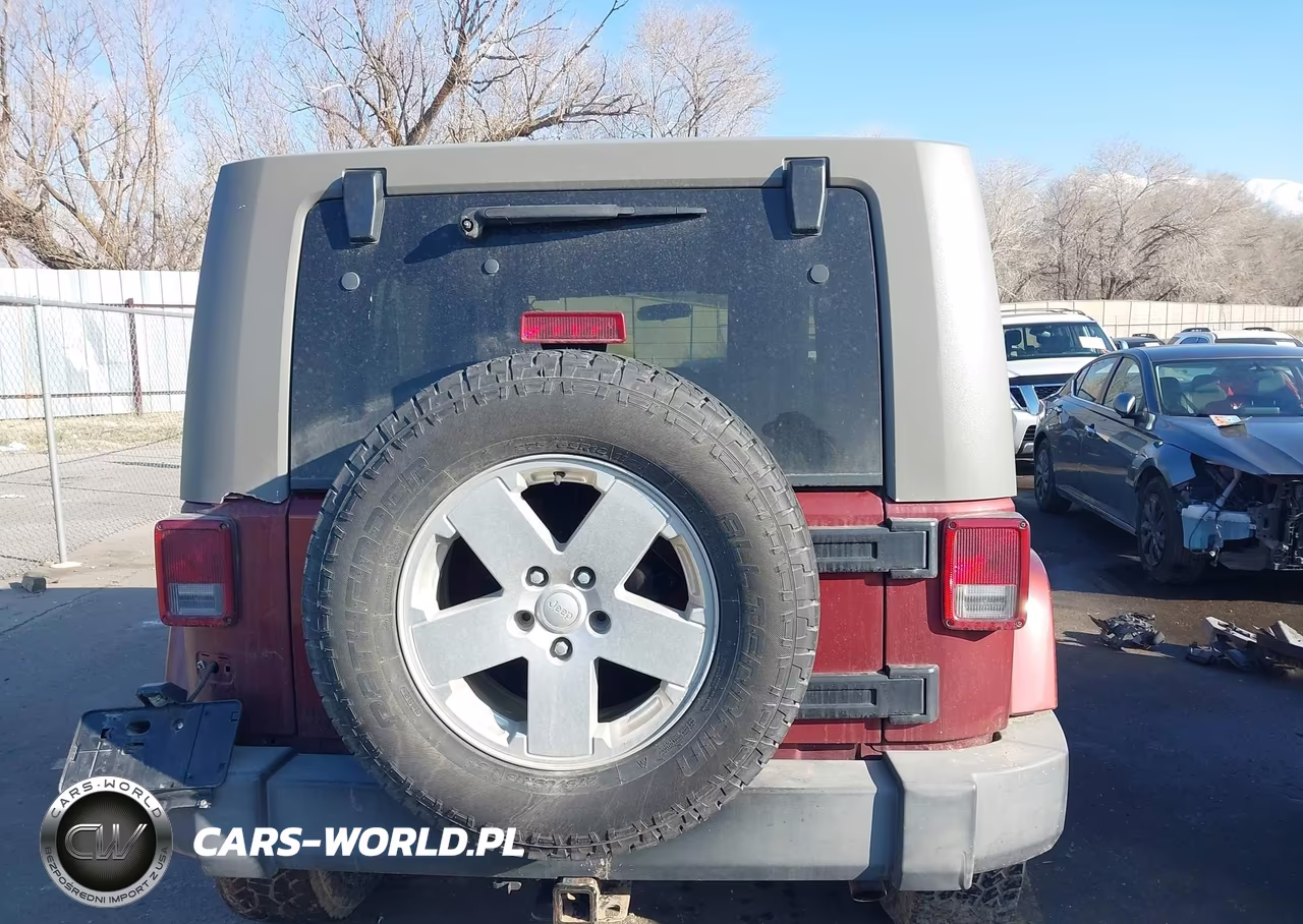 2007 Jeep Wrangler Unlimited Sahara VIN:1J4GA59157L220676 - 16