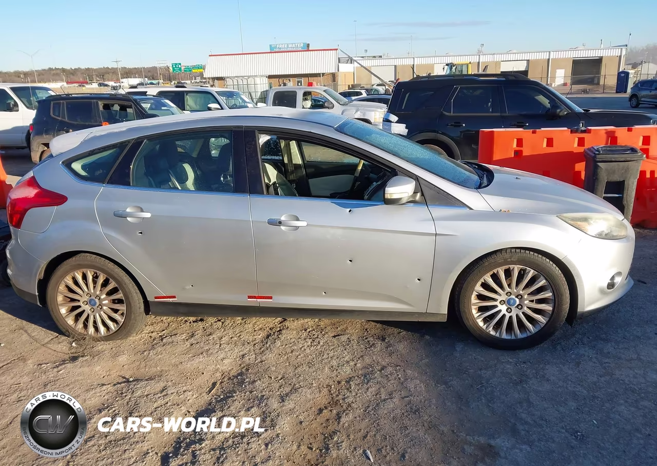 2012 Ford Focus Titanium VIN:1FAHP3N2XCL137854 - 14