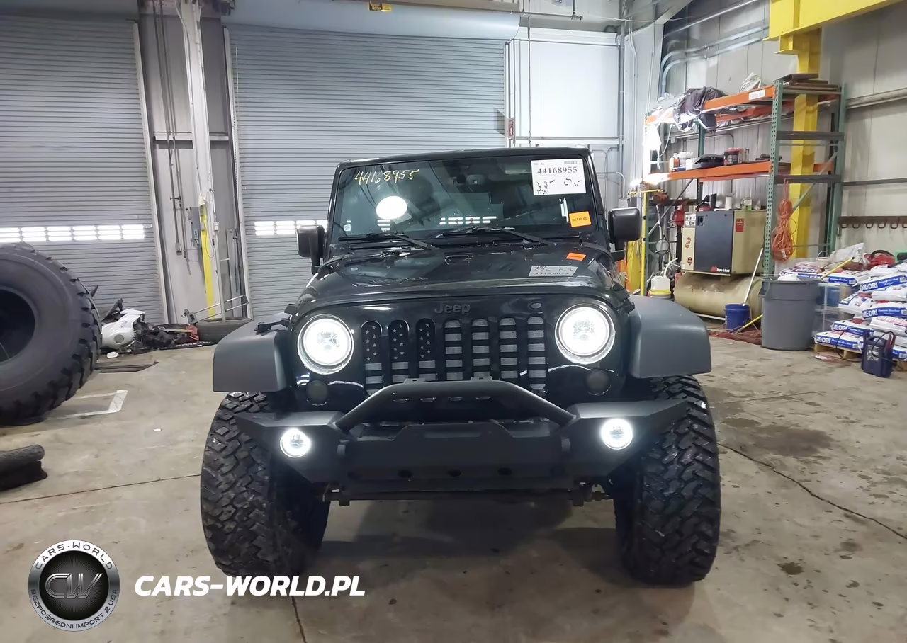 2015 Jeep Wrangler Unlimited Willys Wheeler VIN:1C4BJWDG9FL561840 - 12