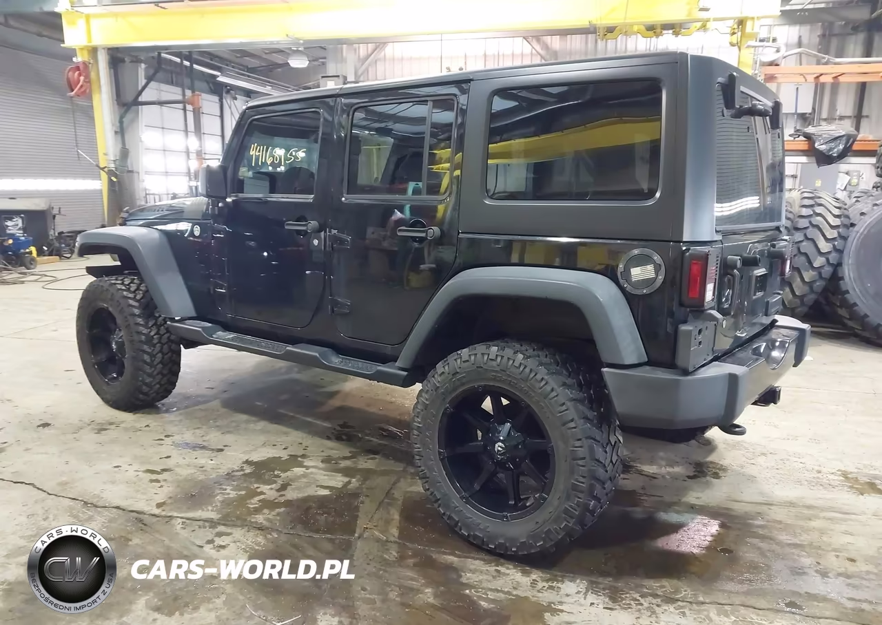 2015 Jeep Wrangler Unlimited Willys Wheeler VIN:1C4BJWDG9FL561840 - 3