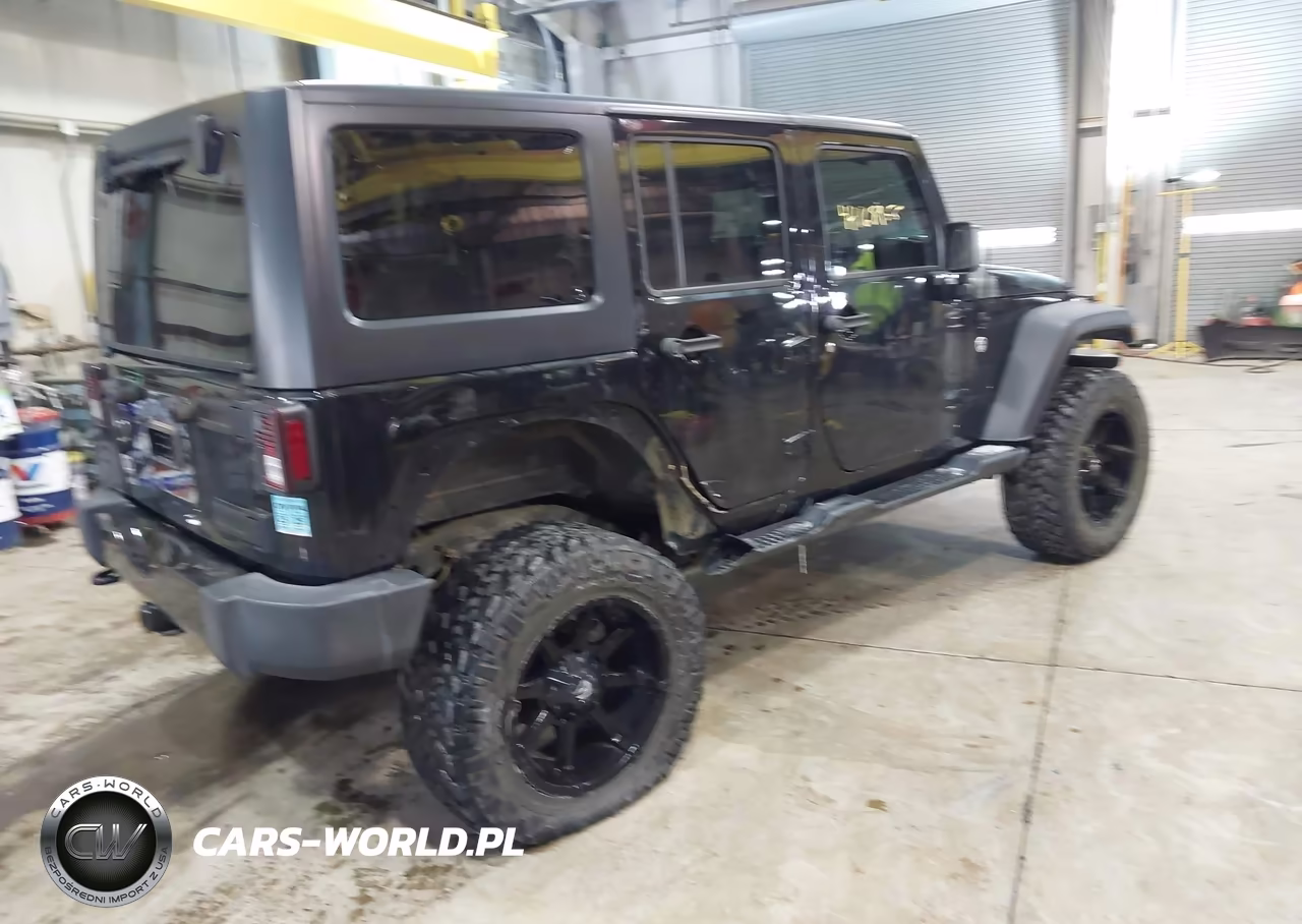 2015 Jeep Wrangler Unlimited Willys Wheeler VIN:1C4BJWDG9FL561840 - 4