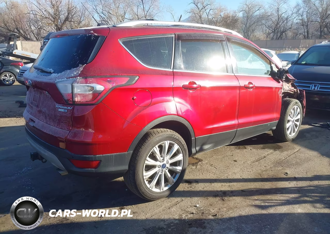 2017 Ford Escape Titanium VIN:1FMCU9J99HUA15583 - 4
