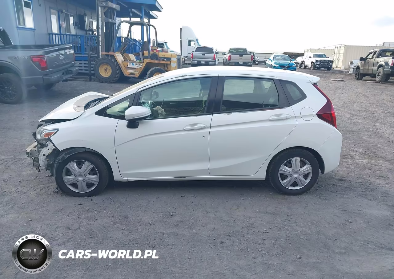 2015 Honda Fit Lx VIN:3HGGK5G54FM780079 - 15