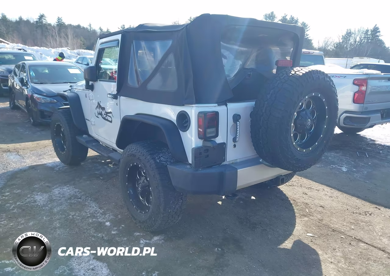 2011 Jeep Wrangler Sahara VIN:1J4AA5D19BL638793 - 3