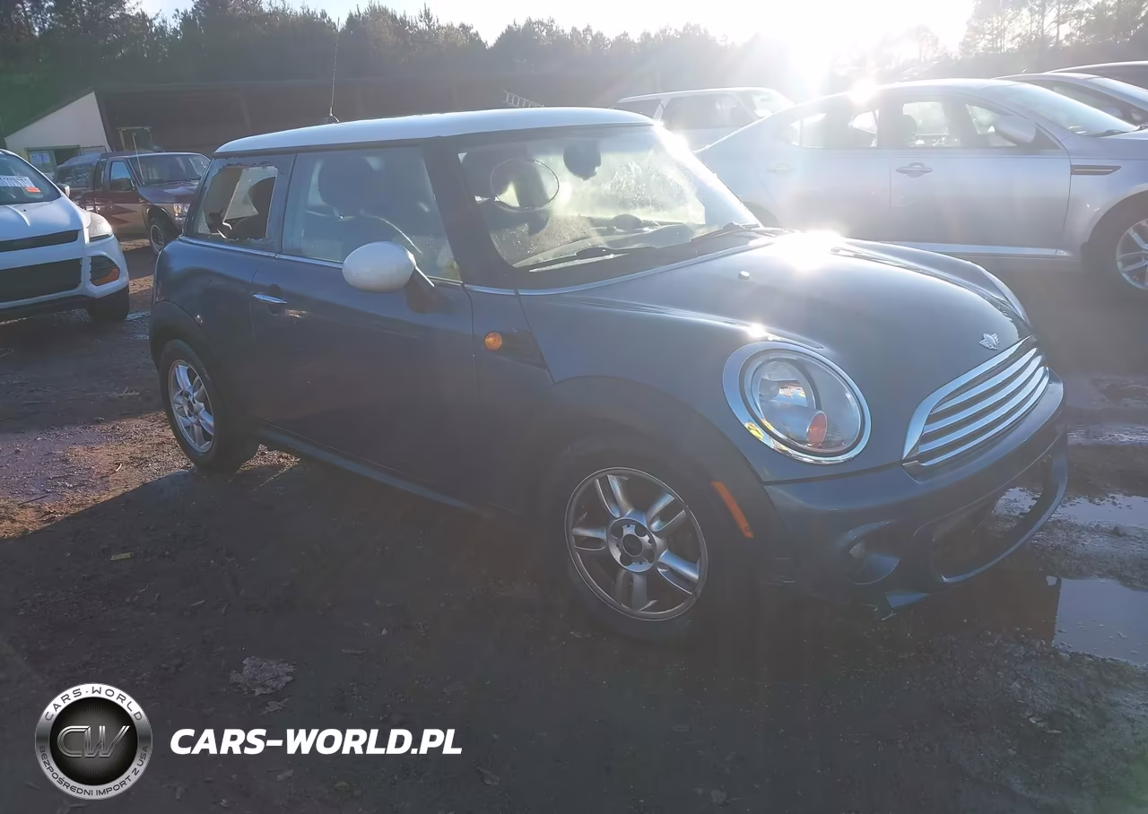 2011 Mini Cooper VIN:WMWSU3C57BT096780 - 1