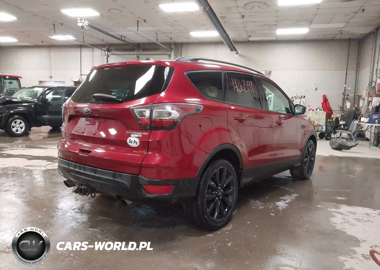 2017 Ford Escape Titanium VIN:1FMCU9J9XHUB55626 - 4