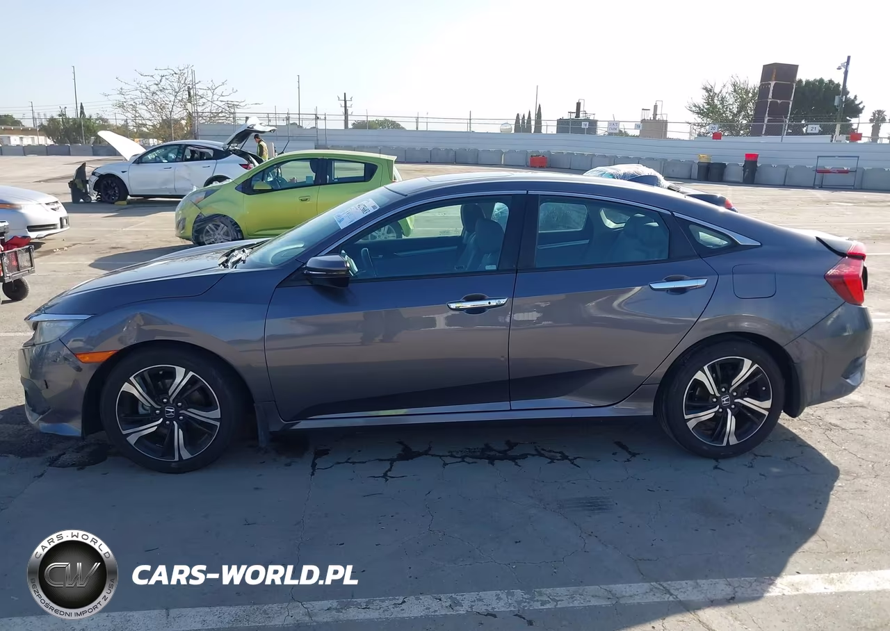 2017 Honda Civic Touring VIN:2HGFC1F92HH634626 - 14