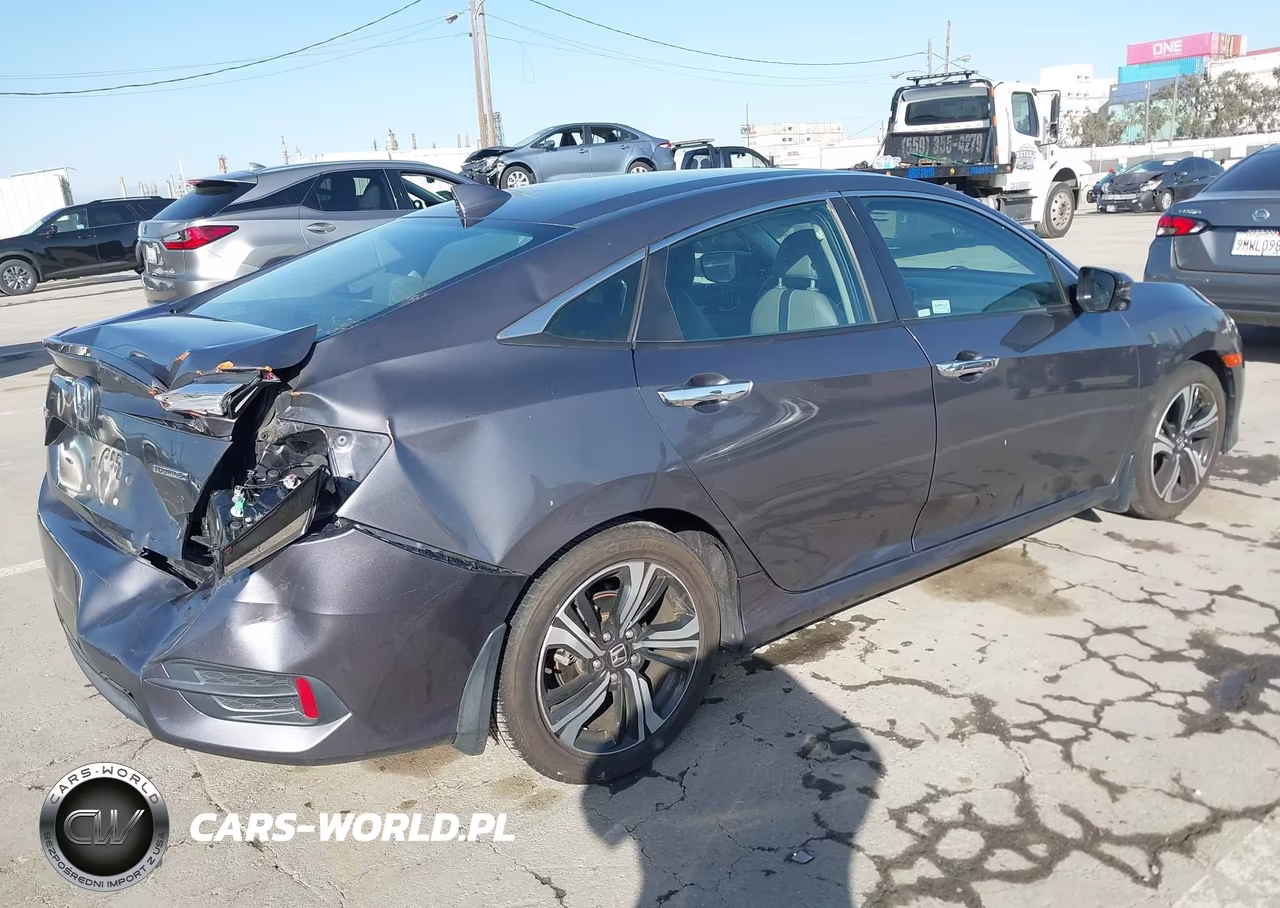 2017 Honda Civic Touring VIN:2HGFC1F92HH634626 - 4