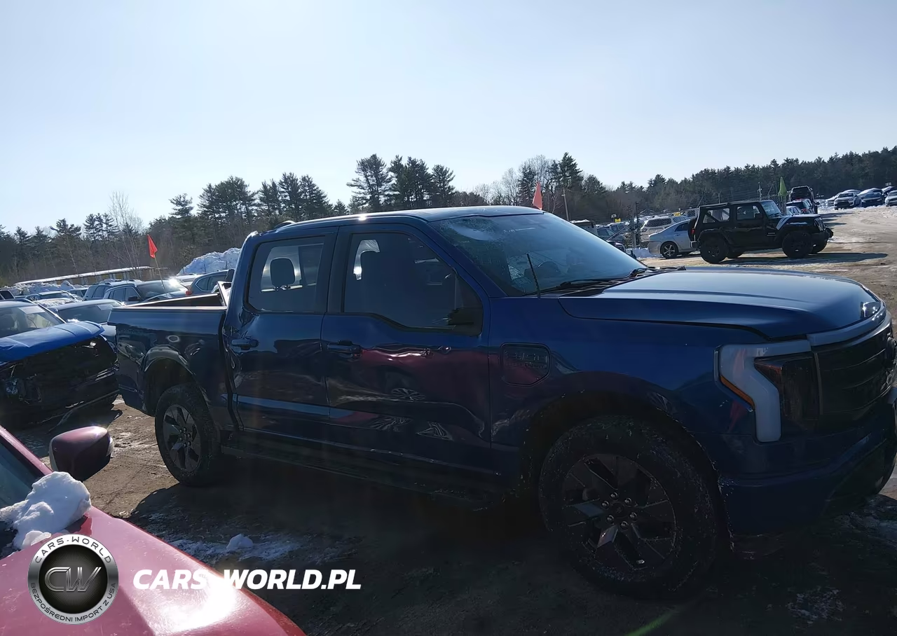 2022 Ford F-150 Lightning Lariat VIN:1FTVW1EV3NWG14219 - 14