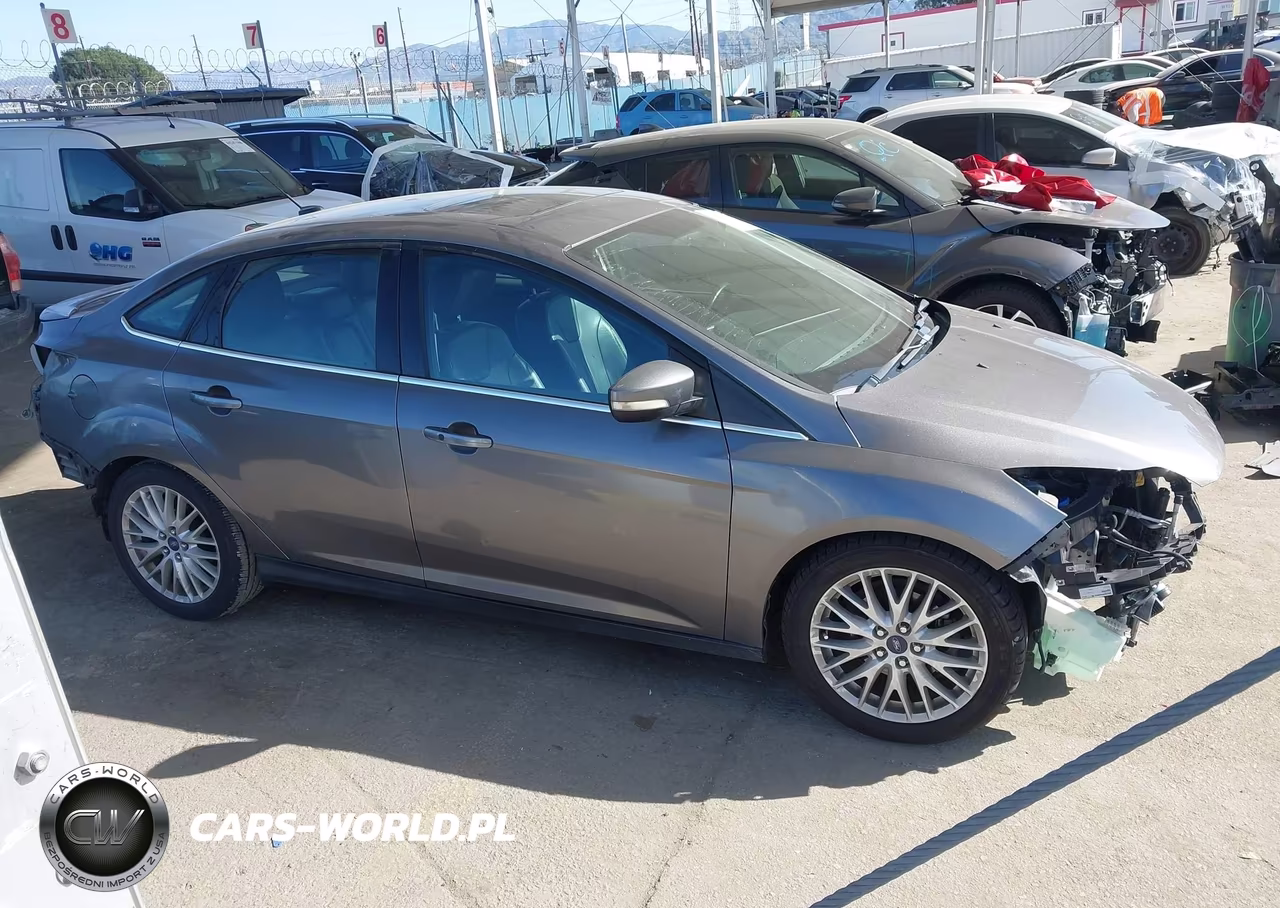 2014 Ford Focus Titanium VIN:1FADP3J24EL138750 - 14