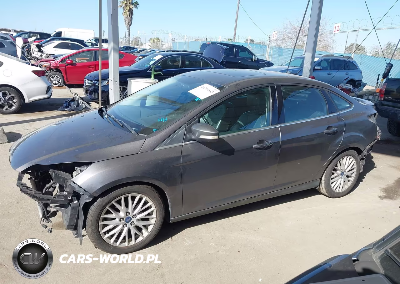 2014 Ford Focus Titanium VIN:1FADP3J24EL138750 - 15