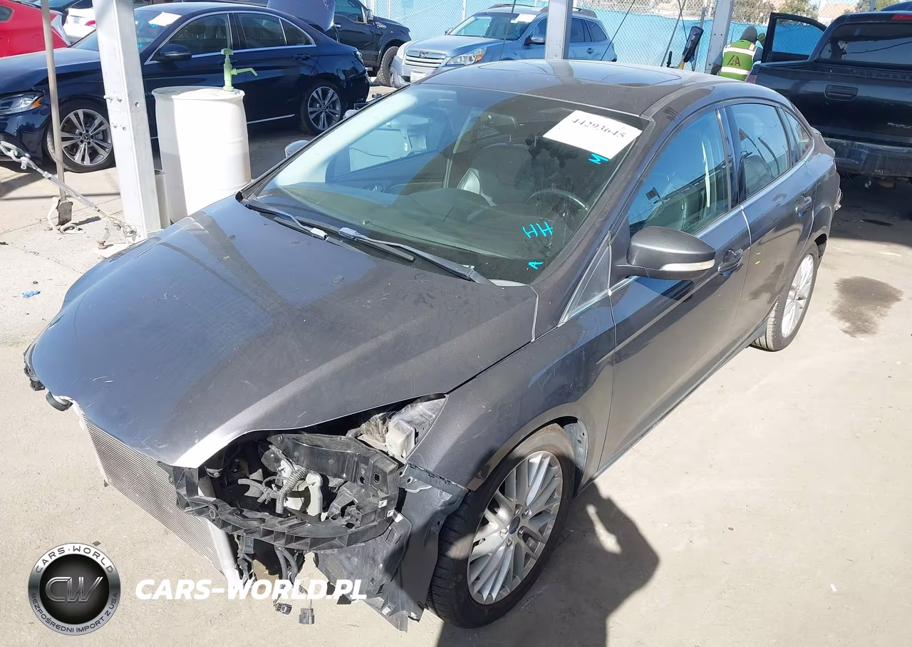 2014 Ford Focus Titanium VIN:1FADP3J24EL138750 - 2