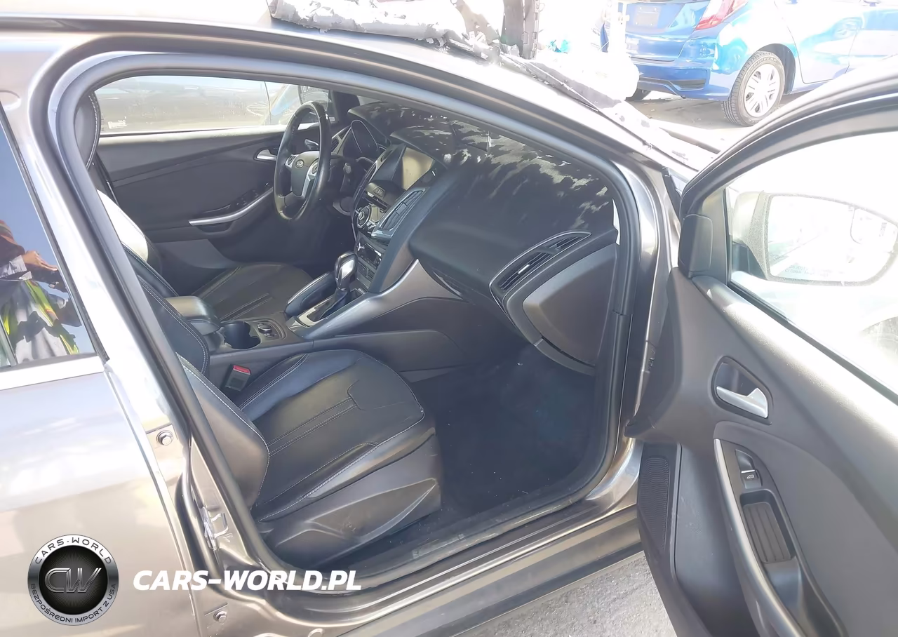 2014 Ford Focus Titanium VIN:1FADP3J24EL138750 - 5