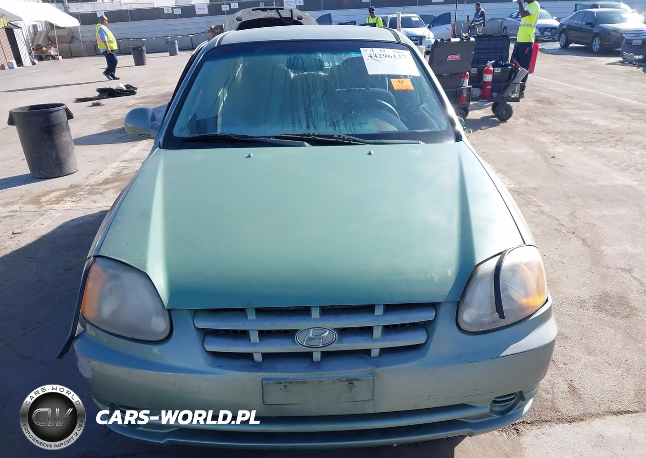 2005 Hyundai Accent Gls VIN:KMHCG45C65U605896 - 11