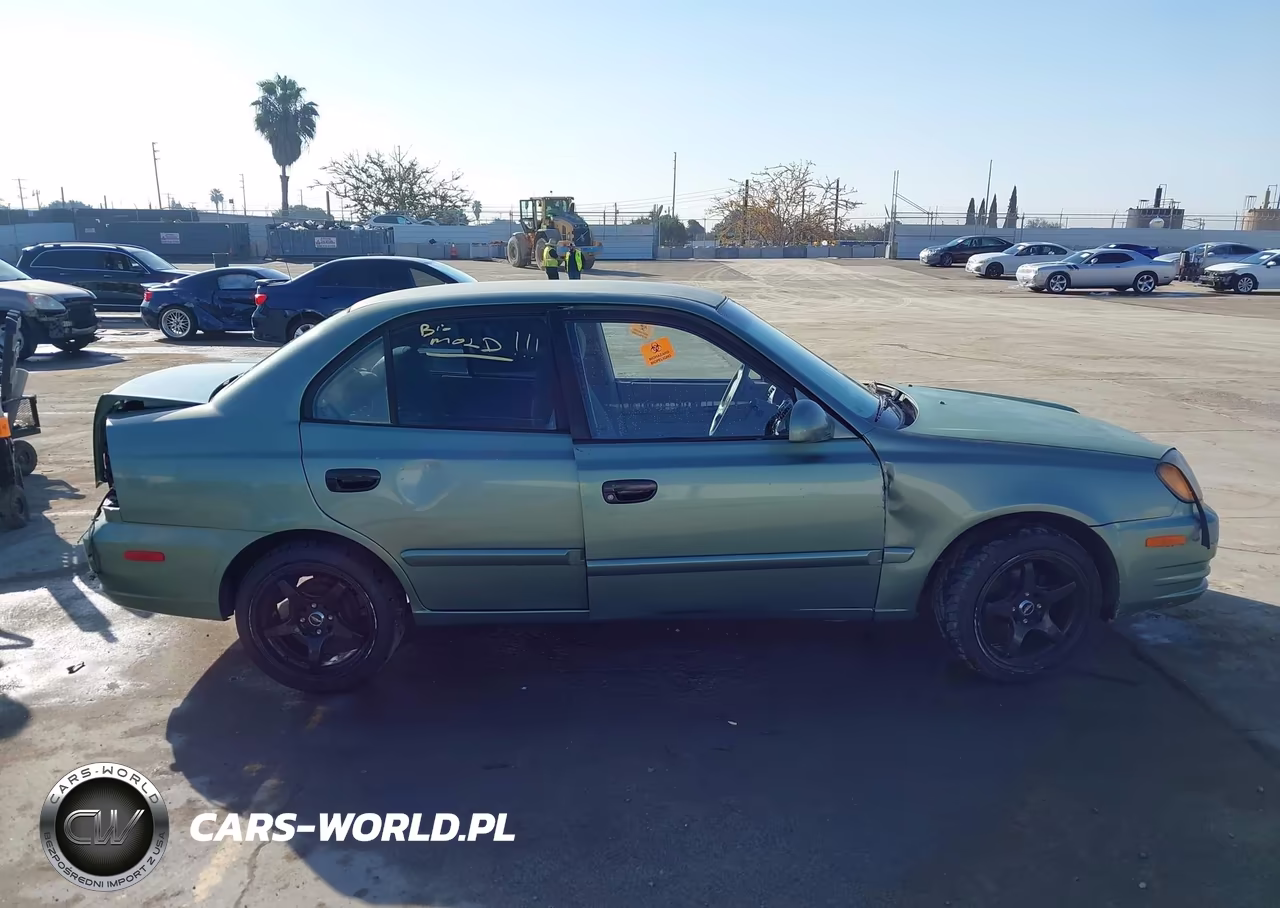 2005 Hyundai Accent Gls VIN:KMHCG45C65U605896 - 12