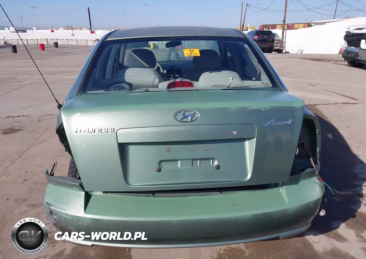 2005 Hyundai Accent Gls VIN:KMHCG45C65U605896 - 15