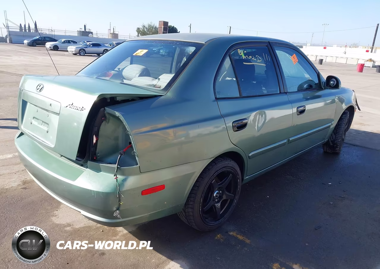 2005 Hyundai Accent Gls VIN:KMHCG45C65U605896 - 4
