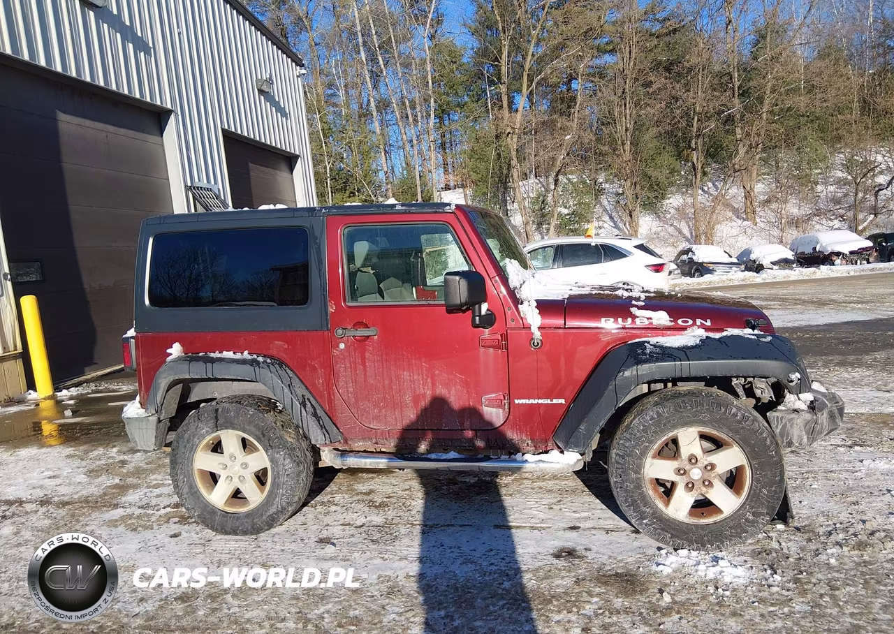 2009 Jeep Wrangler Rubicon VIN:1J4GA64139L727270 - 13