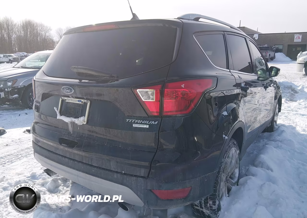 2019 Ford Escape Titanium VIN:1FMCU0J9XKUA90506 - 4