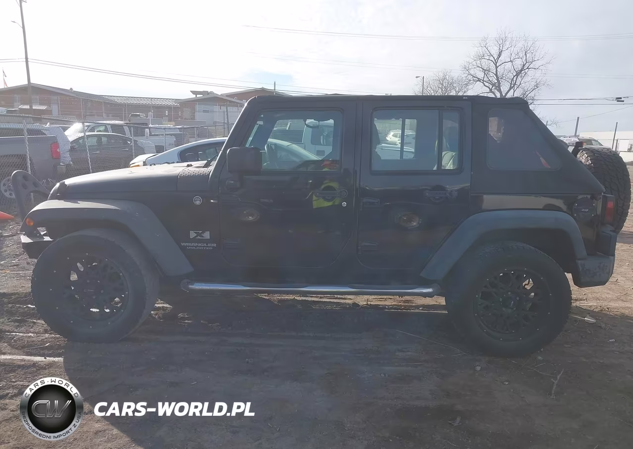 2009 Jeep Wrangler Unlimited X VIN:1J4GA39159L771536 - 14
