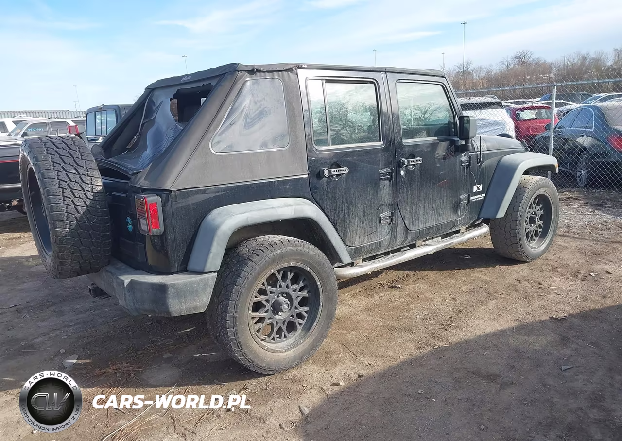 2009 Jeep Wrangler Unlimited X VIN:1J4GA39159L771536 - 4