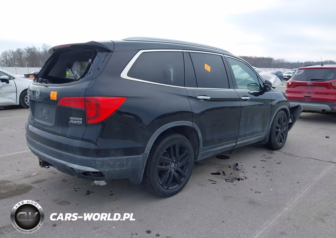 2017 Honda Pilot Touring VIN:5FNYF6H91HB010279 - 4