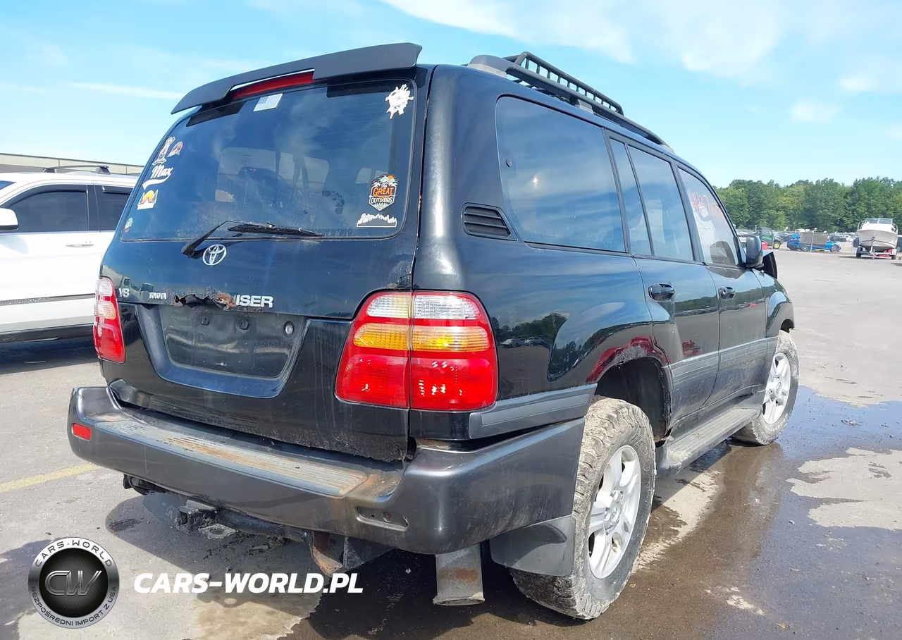 1999 Toyota Land Cruiser VIN:JT3HT05J4X0057506 - 4