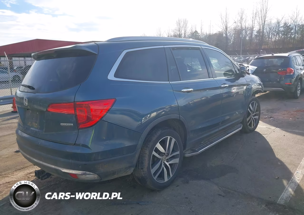2018 Honda Pilot Touring VIN:5FNYF5H99JB004357 - 4