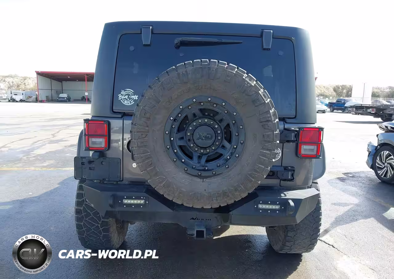 2014 Jeep Wrangler Unlimited Rubicon VIN:1C4BJWFG2EL272200 - 16
