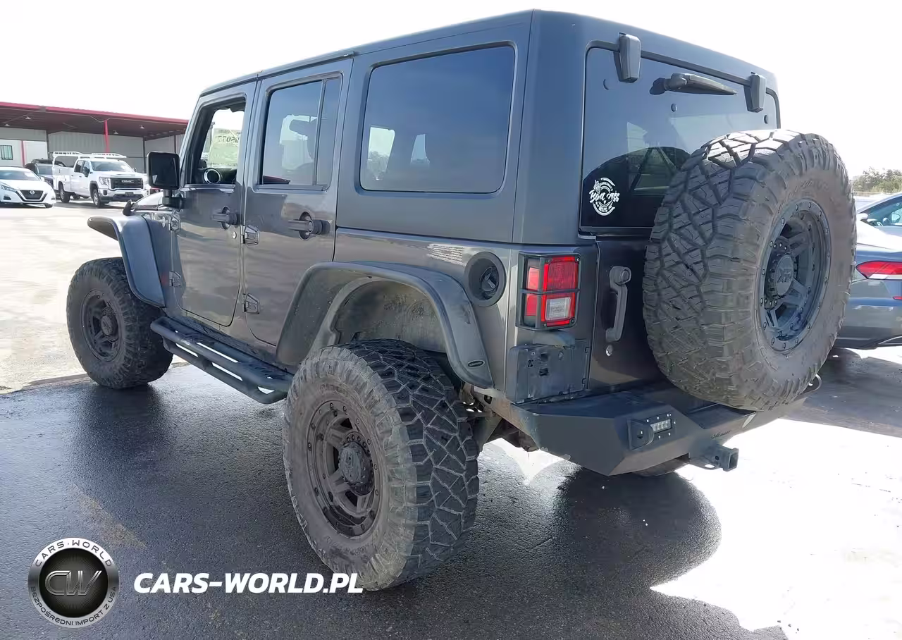 2014 Jeep Wrangler Unlimited Rubicon VIN:1C4BJWFG2EL272200 - 3