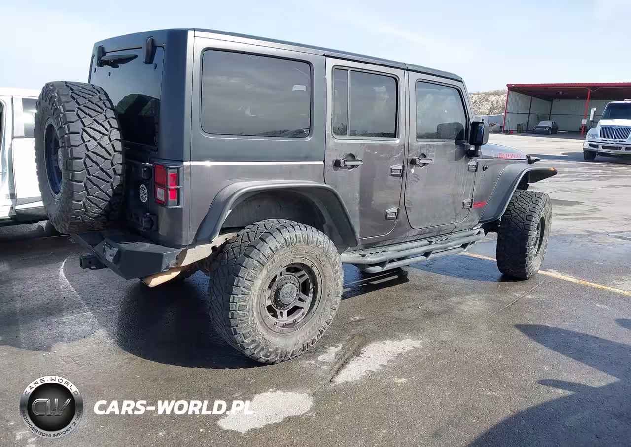 2014 Jeep Wrangler Unlimited Rubicon VIN:1C4BJWFG2EL272200 - 4
