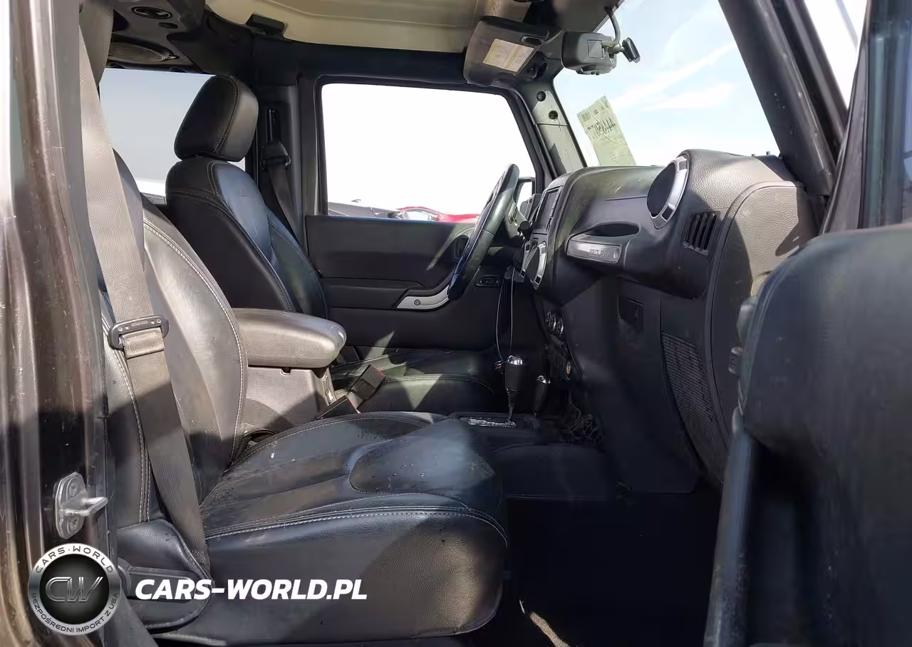 2014 Jeep Wrangler Unlimited Rubicon VIN:1C4BJWFG2EL272200 - 5