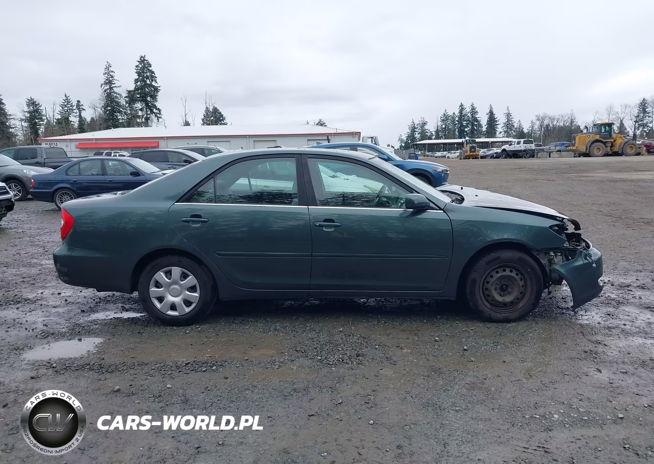 2002 Toyota Camry Le VIN:JTDBE32K320005268 - 14