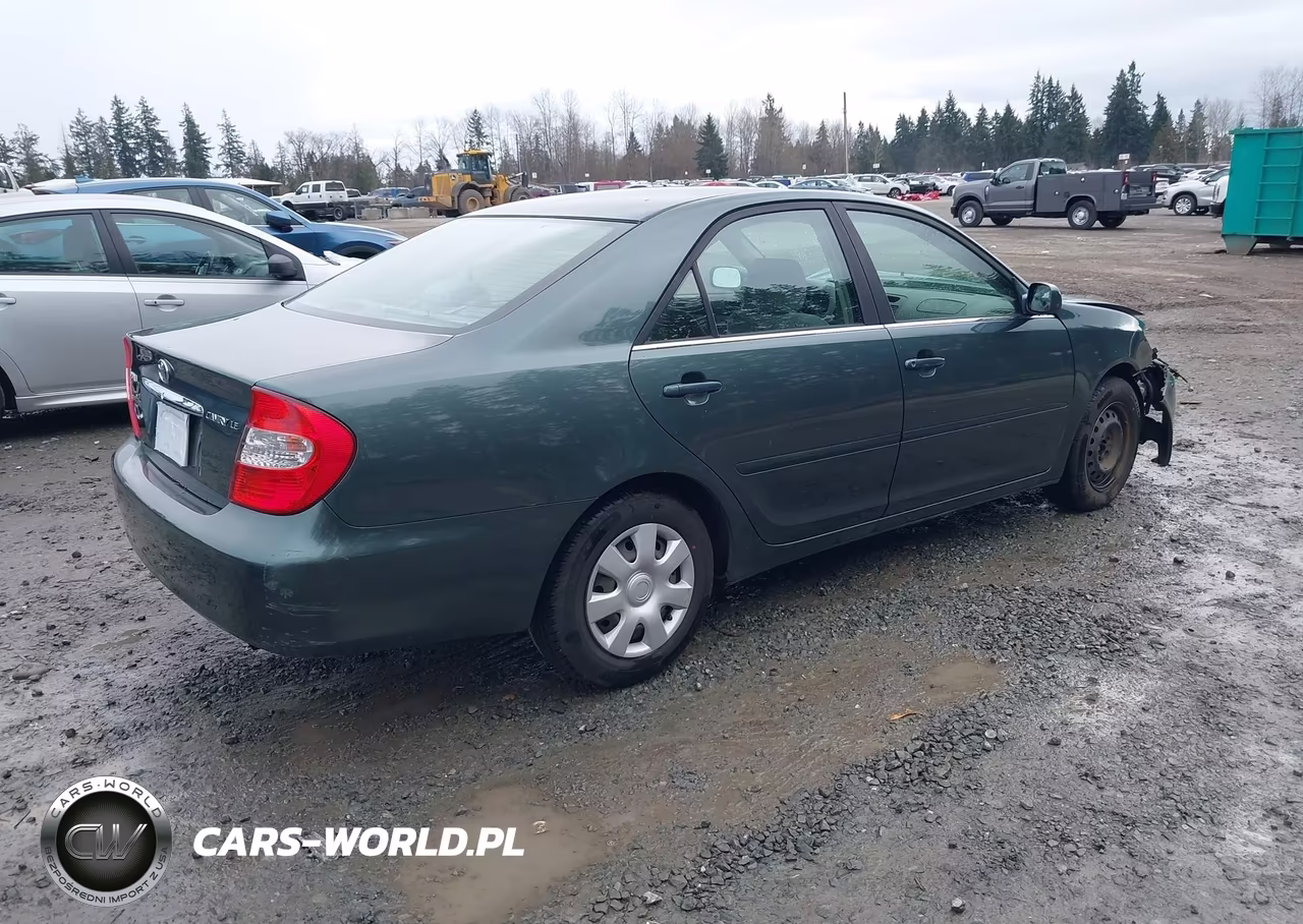 2002 Toyota Camry Le VIN:JTDBE32K320005268 - 4