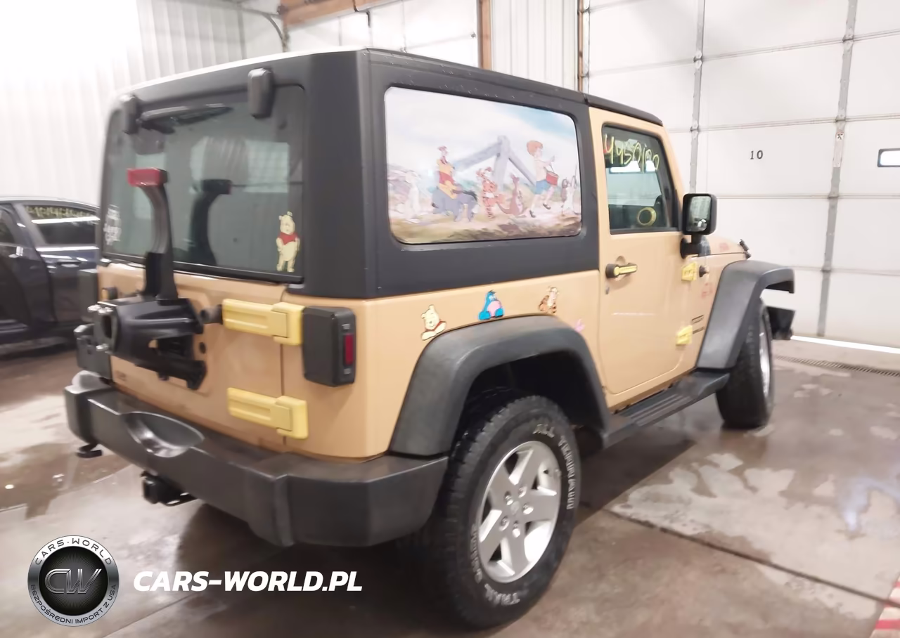 2013 Jeep Wrangler Sport VIN:1C4AJWAG4DL702701 - 4
