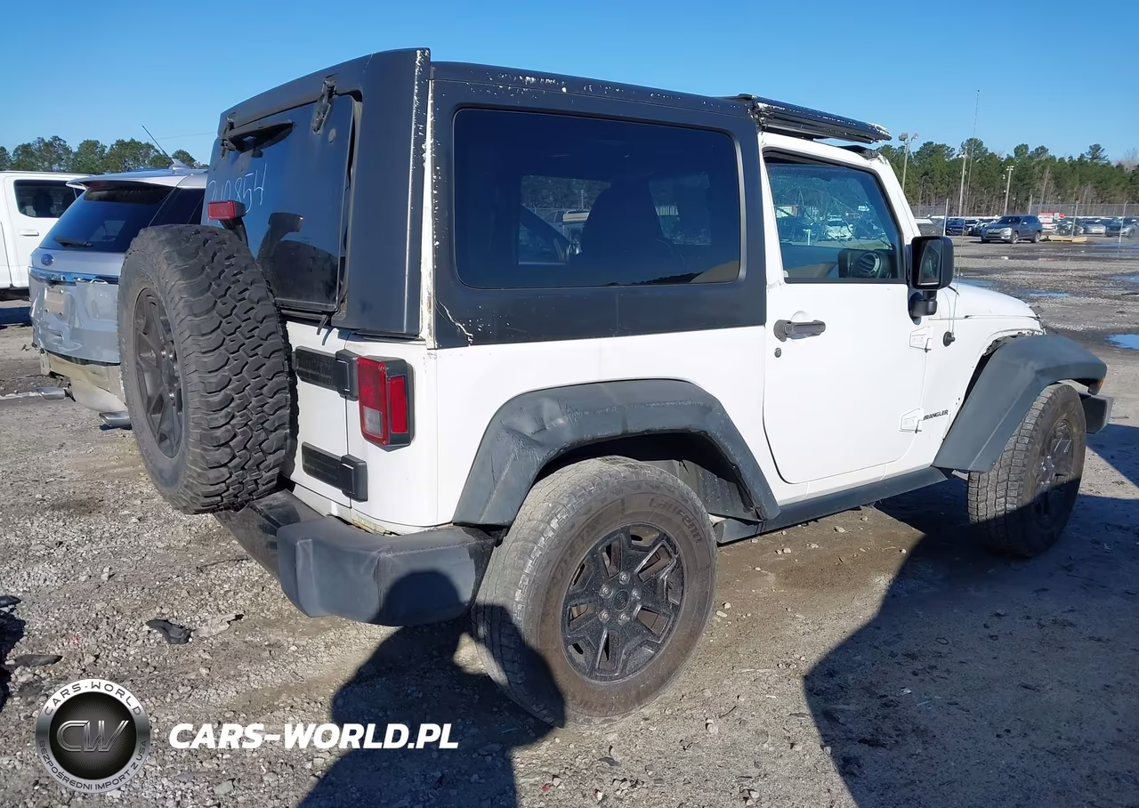 2015 Jeep Wrangler Willys Wheeler VIN:1C4AJWAG5FL742854 - 4