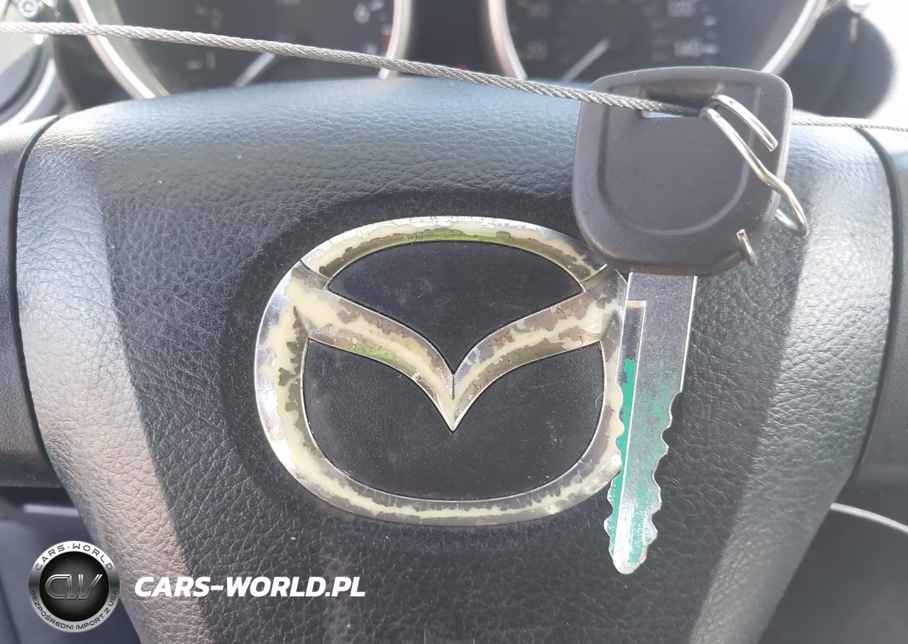 2010 Mazda Mazda3 I Touring VIN:JM1BL1SG7A1144852 - 11