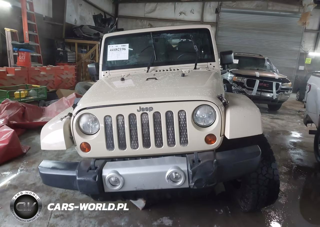 2011 Jeep Wrangler Unlimited Sahara VIN:1J4BA5H1XBL624822 - 13