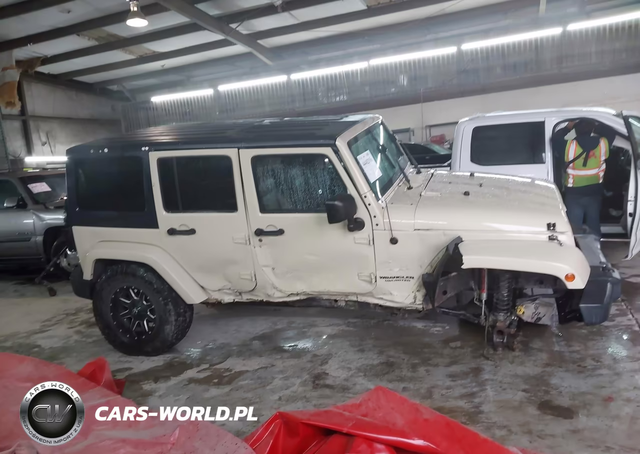 2011 Jeep Wrangler Unlimited Sahara VIN:1J4BA5H1XBL624822 - 14