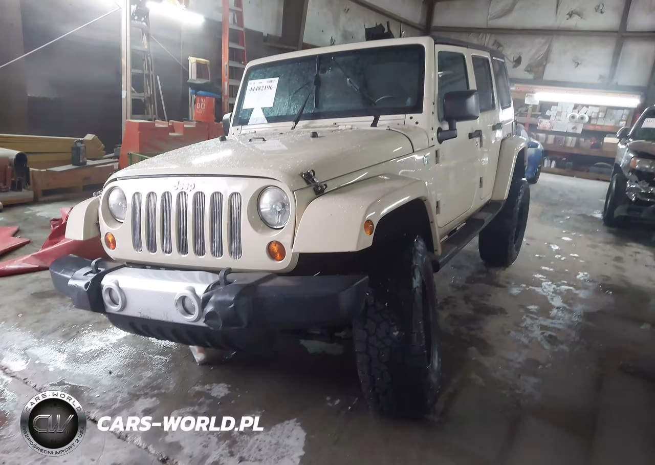 2011 Jeep Wrangler Unlimited Sahara VIN:1J4BA5H1XBL624822 - 2