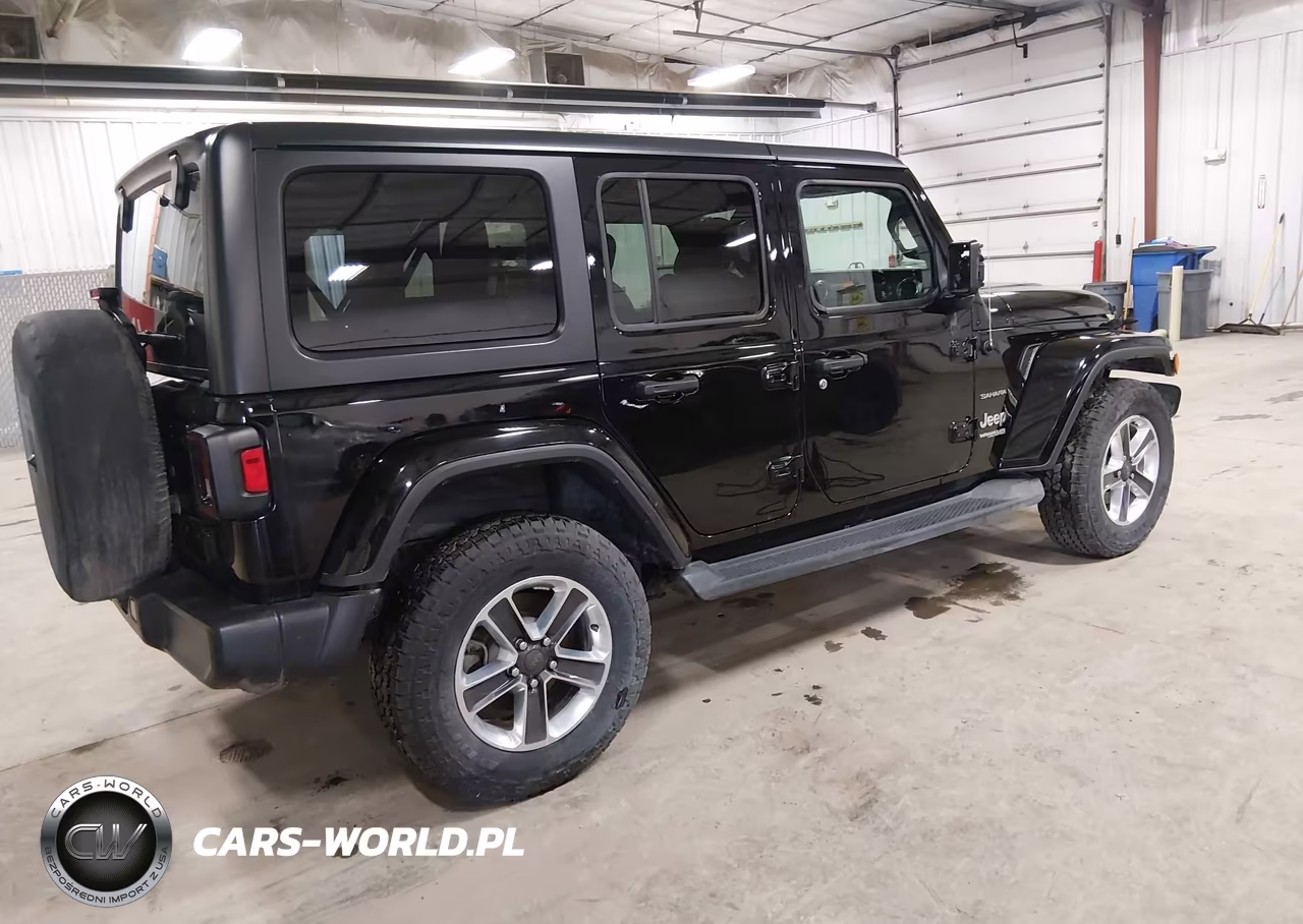 2019 Jeep Wrangler Unlimited Sahara 4X4 VIN:1C4HJXEG5KW515378 - 4