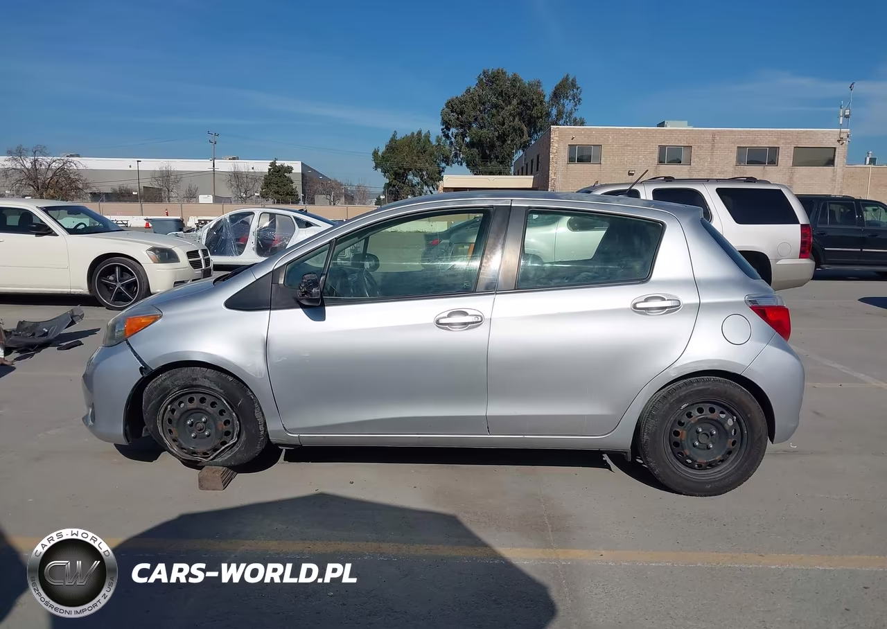 2012 Toyota Yaris Le VIN:JTDKTUD36CD523614 - 14