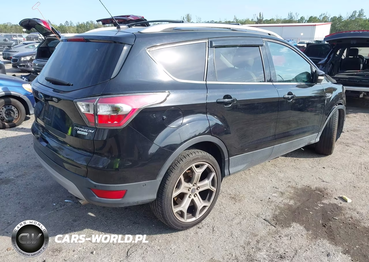 2017 Ford Escape Titanium VIN:1FMCU0J95HUA36314 - 4