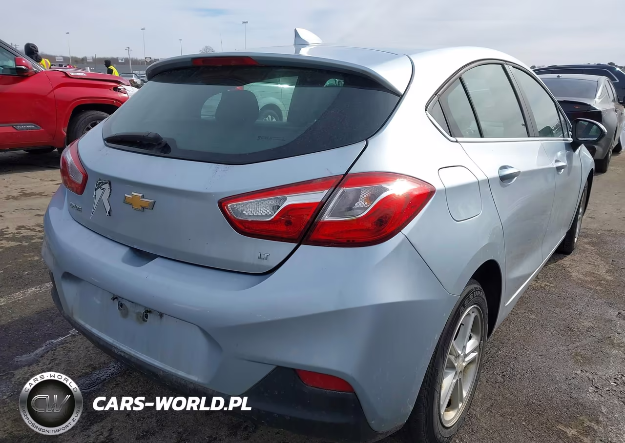 2018 Chevrolet Cruze Lt Auto VIN:3G1BE6SM0JS560634 - 4