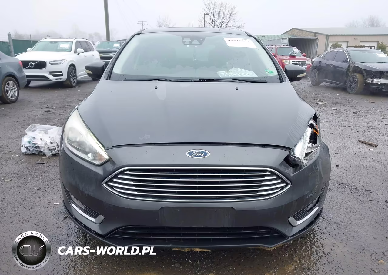 2016 Ford Focus Titanium VIN:1FADP3N2XGL372114 - 12