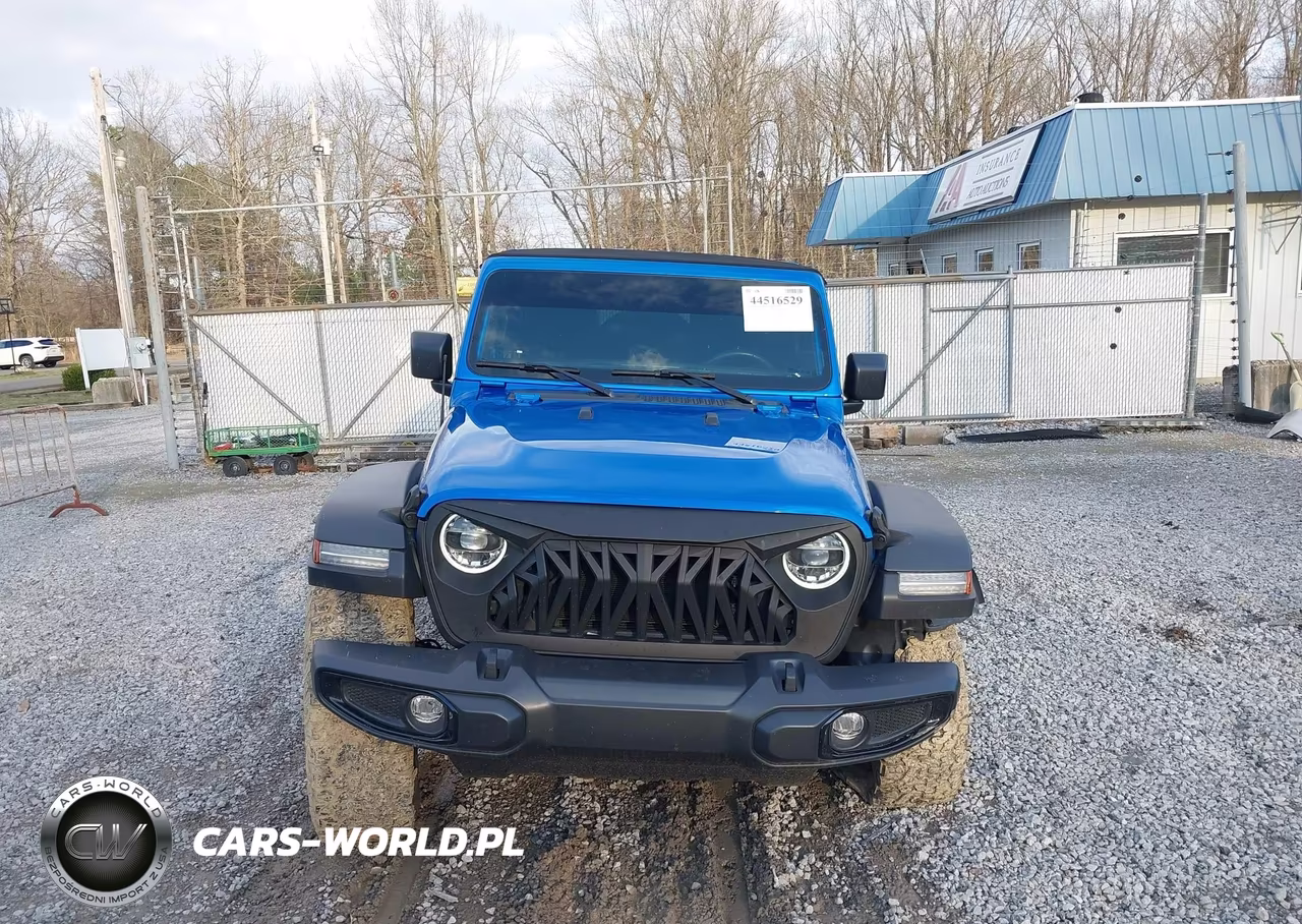 2022 Jeep Wrangler Unlimited High Tide 4X4 VIN:1C4HJXDGXNW244260 - 12